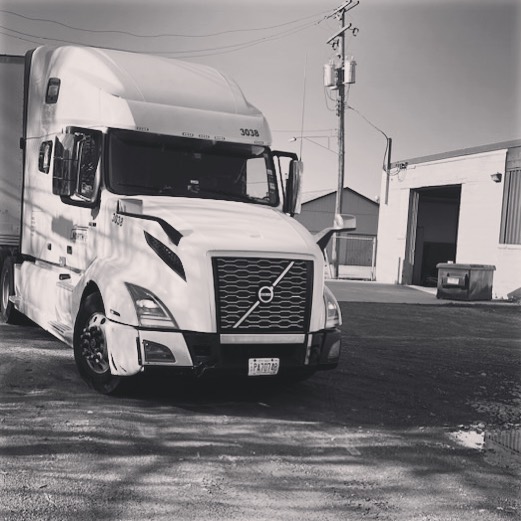 Volvo truck photographed in a transport yard