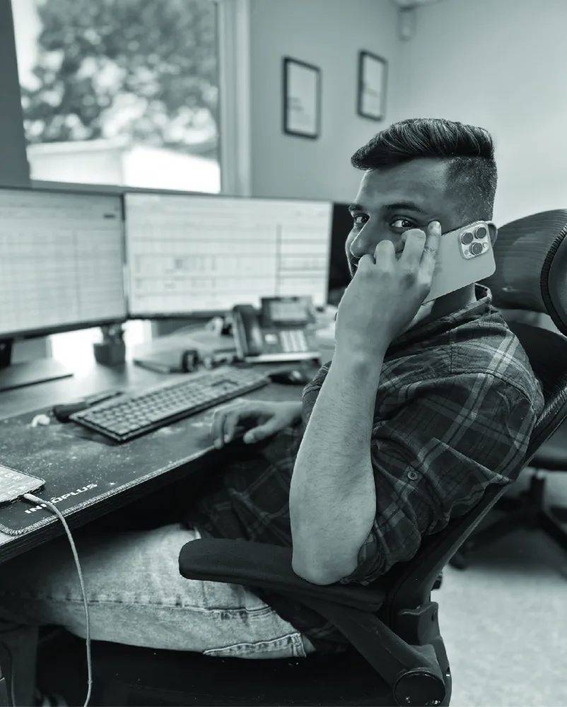 Team member coordinating transportation by phone